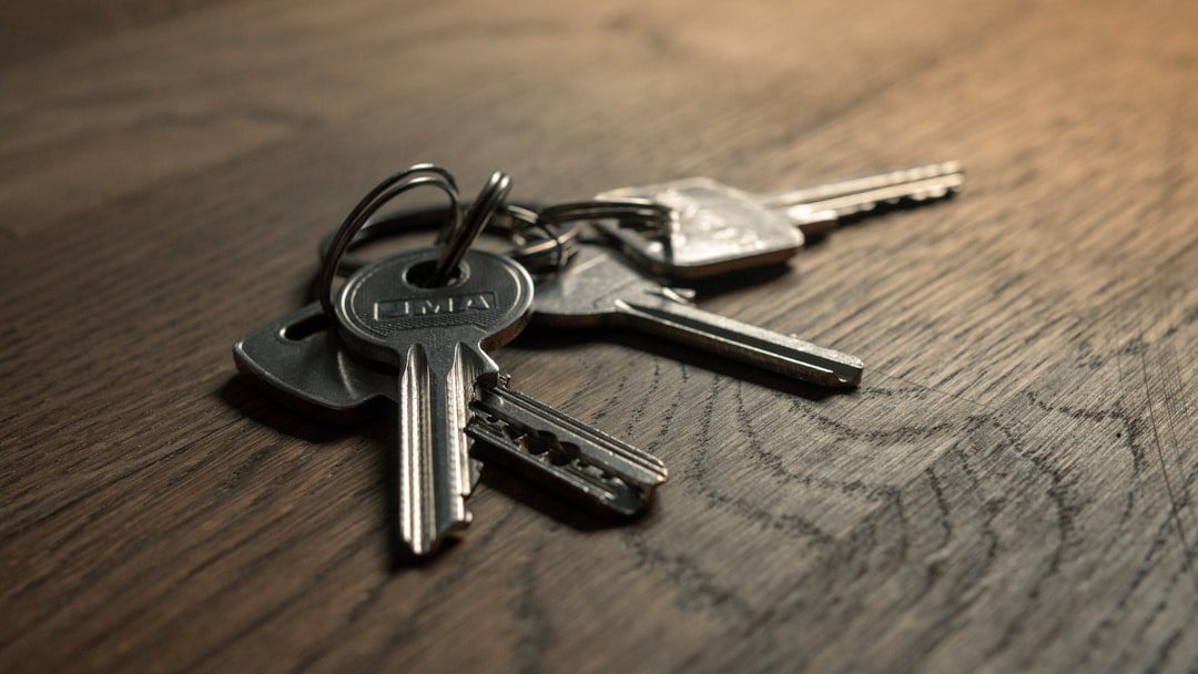 House keys placed neatly on a wooden surface