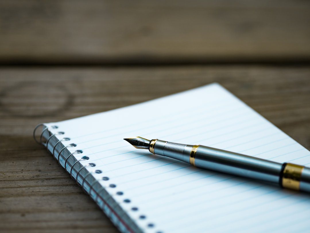 Premium pen and notebook on a professional desk